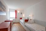 Schlafzimmer 2, 2 Einzelbetten mit Ausziehfunktion - Dachsteinblick by Alpendyll Apartments - Top-Hundeurlaub