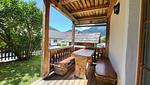 Terrasse mit Sitzgelegenheit und Aussicht in die Berge - Stodertraum 1 "Vergissmeinnicht" by Alpenidyll Apartments - Top-Hundeurlaub
