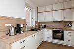 Küche / Küchenzeile - Panorama-Maisonette am Yachthafen (Haus 6,Nr.43) Parkplatz direkt am Haus - Top-Hundeurlaub