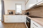 Küche / Küchenzeile - Panorama-Maisonette am Yachthafen (Haus 6,Nr.43) Parkplatz direkt am Haus - Top-Hundeurlaub