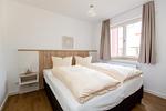 Schlafzimmer - Modernes 2-Zimmerapartment, Haus 6 Nr 45 - Top-Hundeurlaub