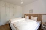 Schlafzimmer - Modernes 2-Zimmerapartment, Haus 6 Nr 45 - Top-Hundeurlaub