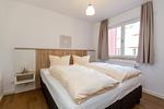 Schlafzimmer - Modernes 2-Zimmerapartment, Haus 6 Nr 45 - Top-Hundeurlaub