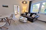 Wohnzimmer - FeWo 08 MEERferien: Terrasse - Top-Hundeurlaub