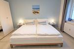 Schlafzimmer - FeWo 08 MEERferien: Terrasse - Top-Hundeurlaub