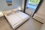 Schlafzimmer - FeWo 08 MEERferien: Terrasse - Top-Hundeurlaub