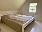 Schlafzimmer mit Doppelbett im Ferienhaus Hus Kråksmåla - Hus Kråksmåla - Top-Hundeurlaub