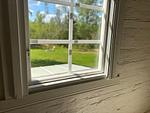 Blick in die Natur aus dem Schlafzimmer im Hus Kråksmåla - Hus Kråksmåla - Top-Hundeurlaub