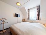 Schlafzimmer mit Doppelbett - Wohnung 11 - Top-Hundeurlaub