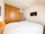 Schlafzimmer mit TV - Wohnung 11 - Top-Hundeurlaub