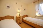 1. Schlafzimmer mit Einzelbetten - Haus 63d - Top-Hundeurlaub