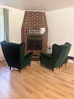 Gemütlicher Kaminbereich im Ferienhaus Stuga Rödhak - Stuga Rödhake - Top-Hundeurlaub