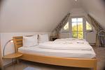 Schlafzimmer - FeWo05:Balkon,Meerblick,Sauna,Schwimmbad - Top-Hundeurlaub