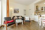 Wohn-Essbereich mit Couch - Dünenschloss 1-17 - Top-Hundeurlaub