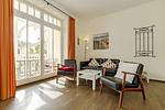 Wohn-Essbereich mit Couch - Dünenschloss 1-17 - Top-Hundeurlaub