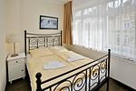 Schlafzimmer mit Doppelbett - Dünenschloss 1-17 - Top-Hundeurlaub