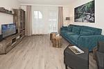 Wohn-Essbereich mit Couch - Seehof 214 - Top-Hundeurlaub