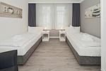 Schlafzimmer mit zwei Einzelbetten - Seehof 214 - Top-Hundeurlaub