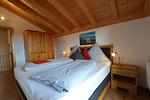 Schlafzimmer - Alpensee - Feriendorf Via Claudia Haus 82 - Top-Hundeurlaub