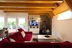 Wohnzimmer - Ferienhaus "Glück Auf! I" Mellumplate 25 - Top-Hundeurlaub