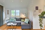 Wohnzimmer - Ferienhaus  54 Grad Ost (19) - Top-Hundeurlaub