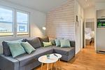 Wohnzimmer - Ferienhaus  54 Grad Ost (19) - Top-Hundeurlaub