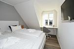 Schlafzimmer - Doppelhaushälfte Böhler Strandhus - Top-Hundeurlaub