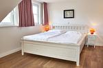 Das Doppelbett im ersten Schlafzimmer ist 1,60 m breit. - Green Garden Wohnung 2 - Top-Hundeurlaub