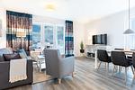 Wohn-/Essbereich mit Zugang zum Balkon - Apartmentanlage Meerblickvilla 3-32 - Top-Hundeurlaub