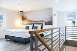 Galerie mit Boxspringbett - Apartmentanlage Meerblickvilla 3-32 - Top-Hundeurlaub