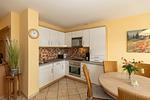 Wohn-Essbereich mit Küchenzeile - Apartmenthaus Atlantik 411 - Top-Hundeurlaub