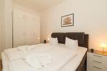 Schlafzimmer mit Doppelbett - Meeresblick 009 - Top-Hundeurlaub