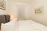 Schlafzimmer mit Doppelbett - Meeresblick 009 - Top-Hundeurlaub