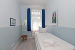 Schlafzimmer mit Etagenbett - Dünenschloss 1-08 - Top-Hundeurlaub