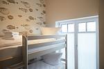 Schlafzimmer - Haus 3 Deluxe-Apartment 9 - Top-Hundeurlaub