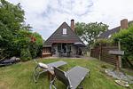Gartenblick - Ferienhaus "Der kleine Leuchtturm" Rotersand 06 - Top-Hundeurlaub