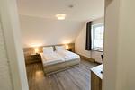 Schlafzimmer - Cuxlandhotel  Doppelzimmer 116 - Top-Hundeurlaub