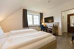 Schlafzimmer - Cuxlandhotel  Doppelzimmer 116 - Top-Hundeurlaub