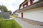 Fassade mit Hauseingang - Reethaus 13b - Top-Hundeurlaub