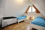 3. Schlafzimmer mit Einzelbetten - Reethaus 02a - Top-Hundeurlaub