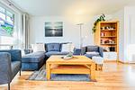 Wohnzimmer mit Sessel - Wohnung 03-1 - Top-Hundeurlaub