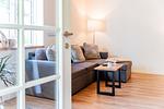 Blick ins Wohnzimmer - Ferienwohnung Hanna im Reethus Mühlenlund - Top-Hundeurlaub