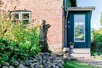 Hauseingang zur Ferienwohnung Hanna - Ferienwohnung Hanna im Reethus Mühlenlund - Top-Hundeurlaub