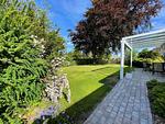 Eingezäunter Garten mit Schaukel und Rutsche - Ferienhaus Landliv Huus - Top-Hundeurlaub