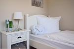 Schlafzimmer - Ferienhaus Gartenweg - Top-Hundeurlaub