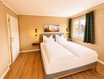 WG1_Ferienhaus kleiner Luchs_Schlafzimmer_01a - Ferienhaus Kleiner Luchs - Top-Hundeurlaub