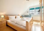 Schlafzimmer - Strandferienwohnung Trixi - Top-Hundeurlaub