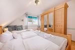 Schlafzimmer - Strandferienwohnung Trixi - Top-Hundeurlaub