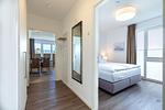 Flur mit Blick zum Schlafzimmer und Wohn-/Essbereich - Aparthotel Ostseeallee 2-11 - Top-Hundeurlaub