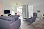 Wohn/ Essbereich mit Couch und Sessel - Aparthotel Anna Düne 2-39 - Top-Hundeurlaub